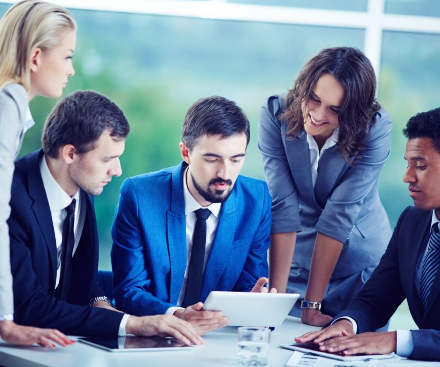 executives-paying-attention-digital-tablet_1098-2279